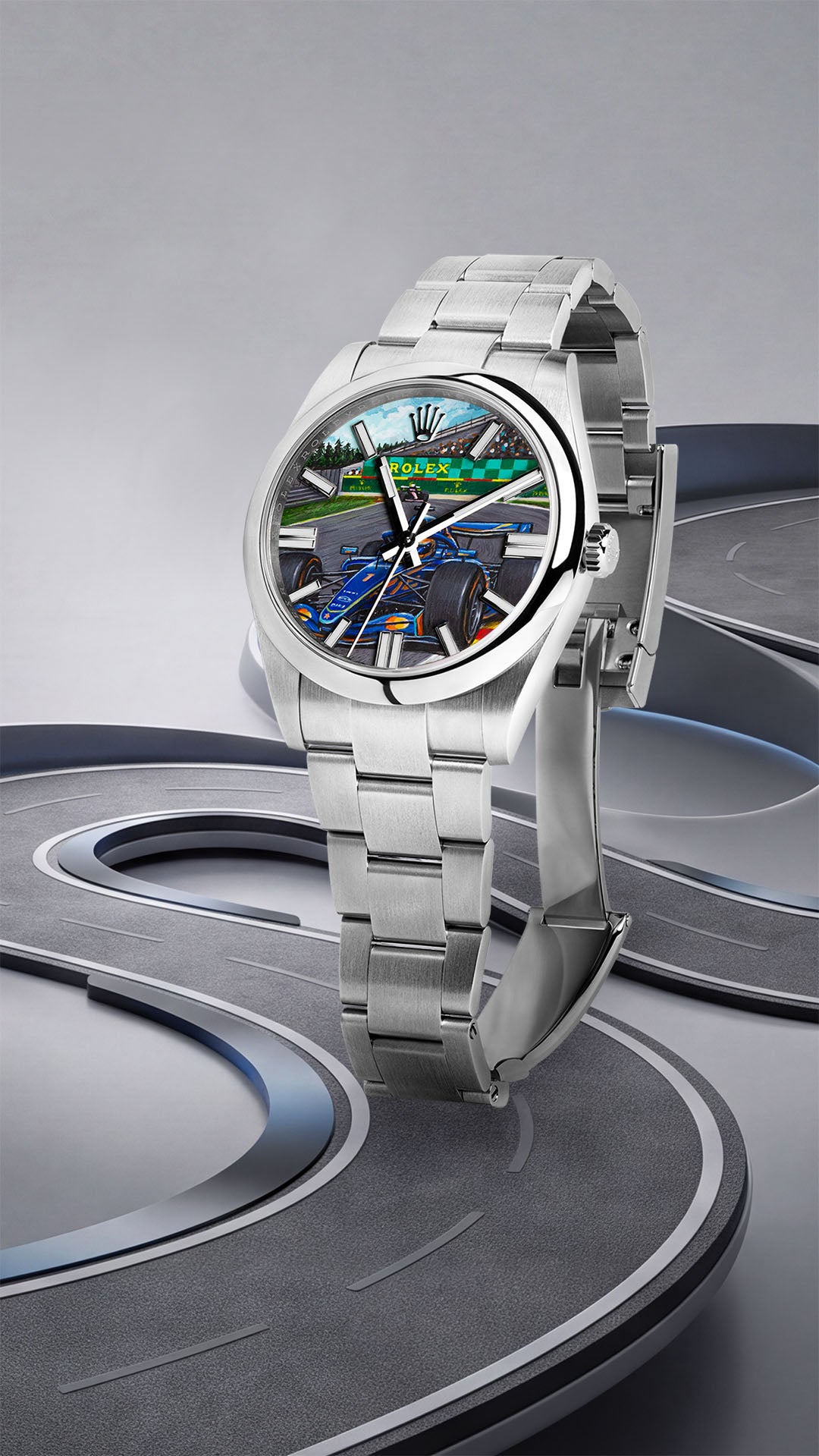 Apex Concept — Hand-painted blue race car mid-corner on the custom dial, the steel watch standing on a looping miniature circuit, by IFL Watches.