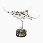 Mecha Ray White — motorised manta with wings swept wide and the gear train visible along its back, on a weighted drive base, kinetic metal sculpture by IFL Watches.