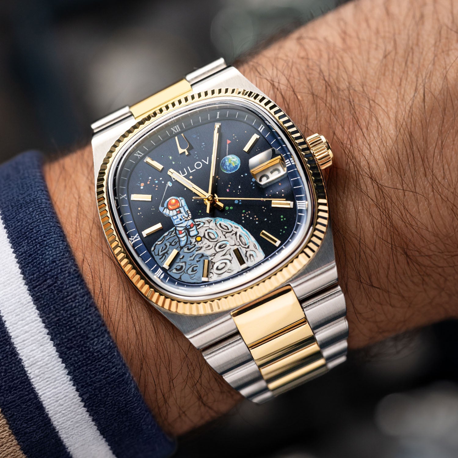 Bulova Super Seville Space Golfer — Hand-painted custom Bulova Super Seville Precisionist featuring an astronaut mid-swing on the lunar surface with vivid paint splatters against a deep blue starfield, a bespoke timepiece by IFL Watches