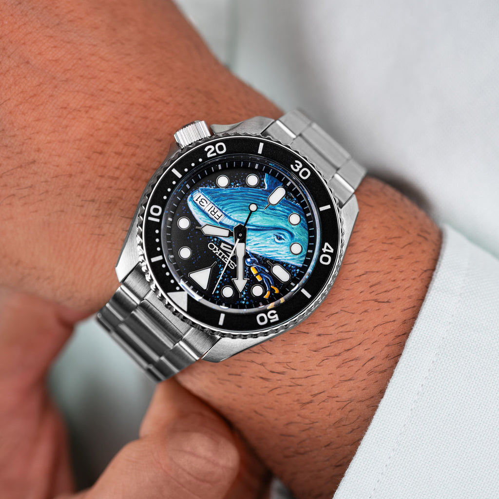 Deep Ocean Diver Concept by IFL Watches, hand-painted custom Seiko Sports 5, featuring a underwater scene with a diver and a whale, limited edition.