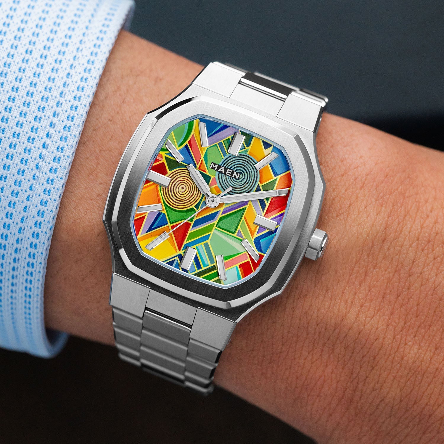 MAEN Manhattan Paradox — macro view of the hand-painted color blocks and two concentric disks across the dial, limited edition timepiece by IFL Watches.