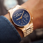 Tsuyosa Rose Gold Who Cares Concept – custom Citizen Tsuyosa with a rose gold-coated case and bracelet, featuring scattered numeral and playful message on the dial by IFL Watches.