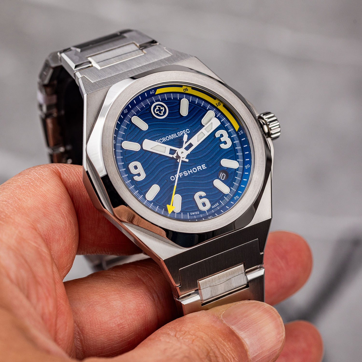 The Offshore – MICROMILSPEC maritime watch with a sea-blue dial and Swiss automatic movement.