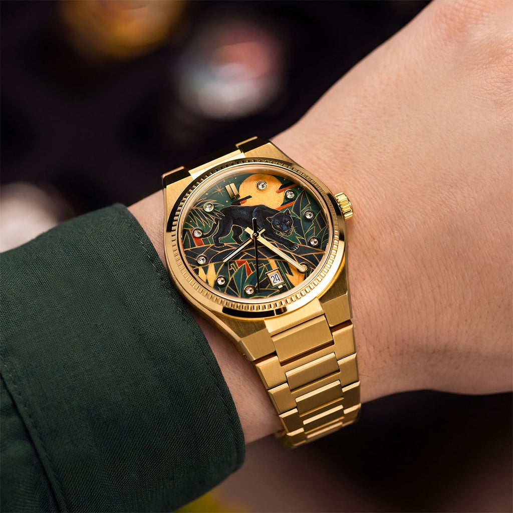 Festina Rive Monarch — Hand-painted custom dial where a black panther crosses an Art Deco landscape in deep emerald beneath an amber moon, crystal-set dot markers around the edge, on a 35mm gold-tone case with fluted bezel and matching bracelet, a bespoke timepiece by IFL Watches.