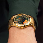 Festina Rive Monarch — Hand-painted custom dial where a black panther crosses an Art Deco landscape in deep emerald beneath an amber moon, crystal-set dot markers around the edge, on a 35mm gold-tone case with fluted bezel and matching bracelet, a bespoke timepiece by IFL Watches.