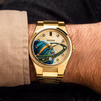 Festina Rive Space Ollie — Custom hand-painted dial viewed at the wrist, showing a ringed planet, scattered paint flecks and crystal-set markers in gold, a bespoke timepiece by IFL Watches.