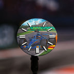 Apex Concept — The hand-painted dial alone before casing, showing the full circuit scene from grandstand to kerb with a second car further up the track, a bespoke timepiece by IFL Watches.