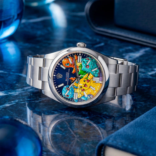 Dream Team Concept — Hand-painted bespoke timepiece featuring four colorful pop art figures rendered in glittering mosaic-tile style on a deep blue 41mm custom automatic dial by IFL Watches