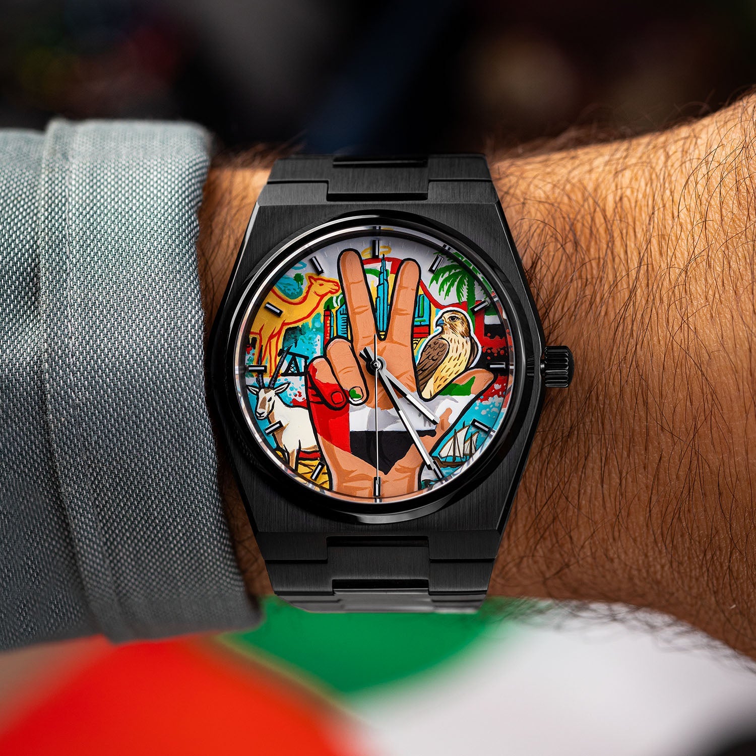 IFL Watches Canvax UAE Unity — Hand-painted custom Canvax featuring the UAE three-finger salute with golden falcon, Arabian oryx, desert camel, and Dubai skyline on a 40mm black matte automatic, a bespoke timepiece by IFL Watches.