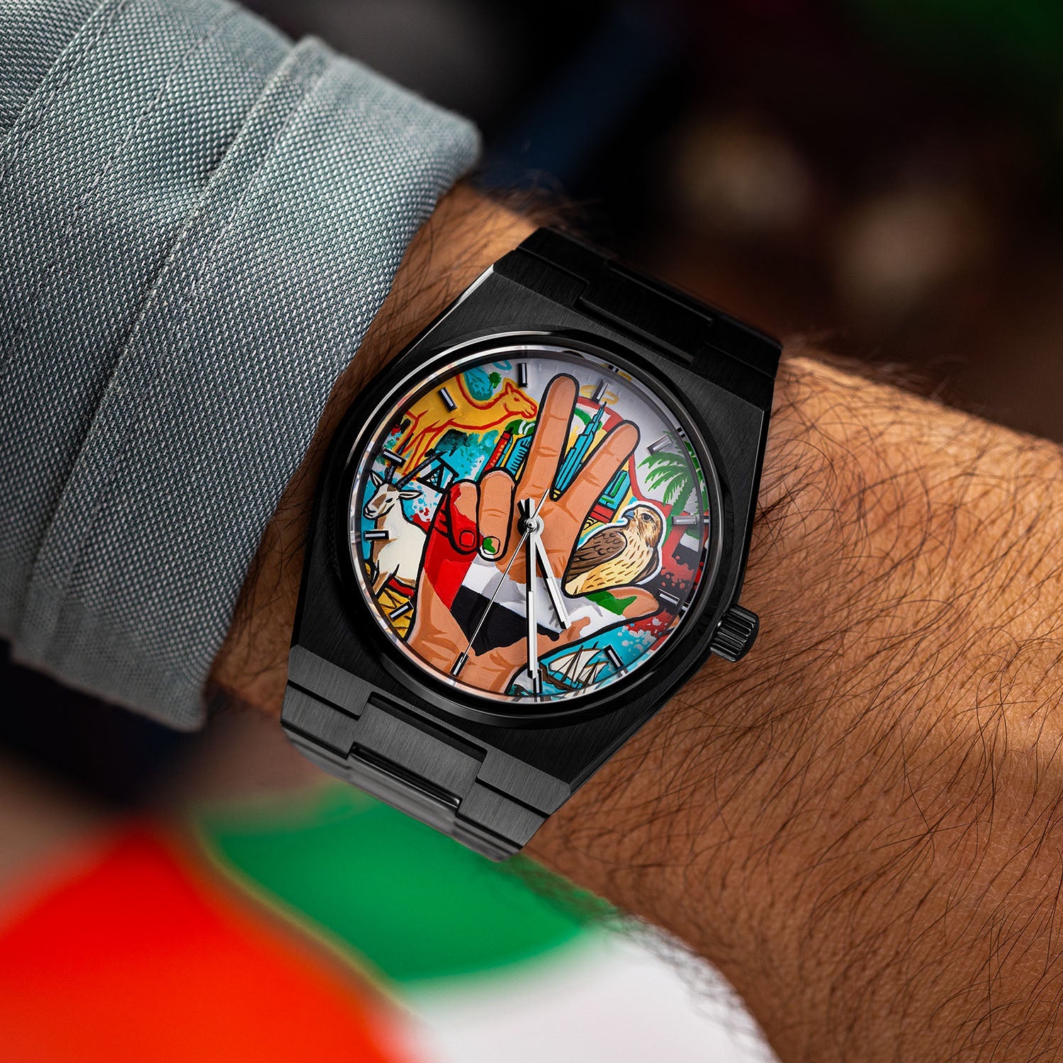 IFL Watches Canvax UAE Unity — Hand-painted custom Canvax featuring the UAE three-finger salute with golden falcon, Arabian oryx, desert camel, and Dubai skyline on a 40mm black matte automatic, a bespoke timepiece by IFL Watches.