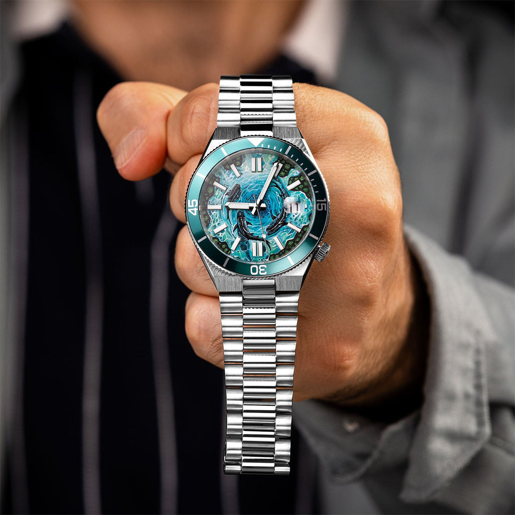 Citizen Tsuyosa Shore Mako held in hand — full front view of the hand-painted shark scene and rotating bezel, limited edition timepiece by IFL Watches.