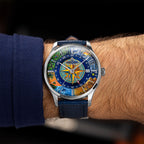 Perrelet Weekend GMT Atlas on the wrist with its blue leather strap — the hand-painted compass dial worn with a navy sleeve, limited edition timepiece by IFL Watches.