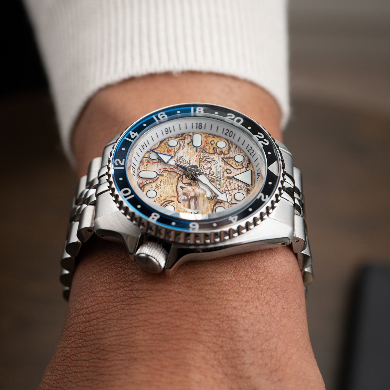 Explorer Concept – Hand-painted custom Seiko 5 GMT featuring ancient map artwork, a limited edition bespoke timepiece by IFL Watches