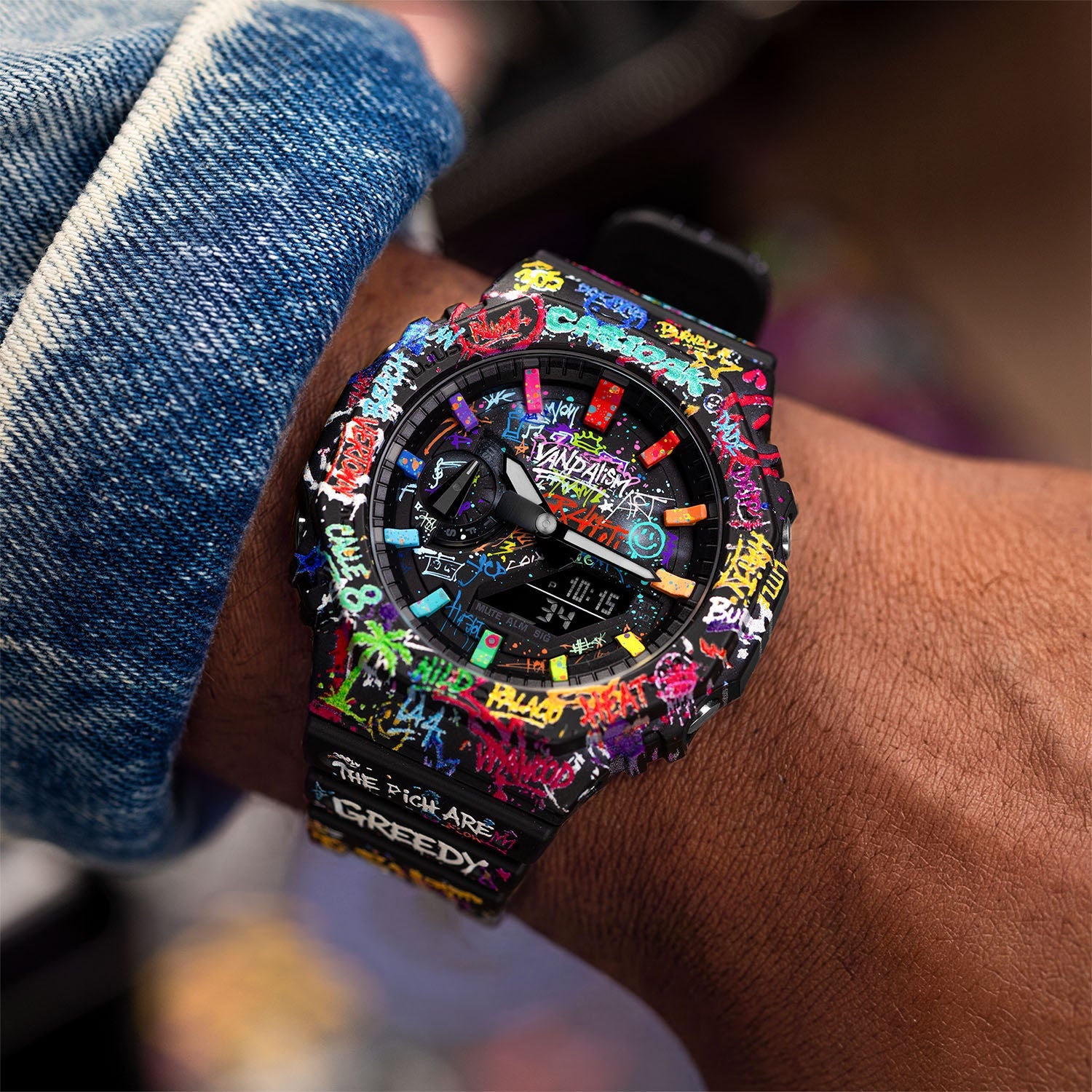 Casio G-Shock Vandalism — Casio G-Shock GA-2100 on the wrist, graffiti across dial, bezel and strap, customized by IFL Watches