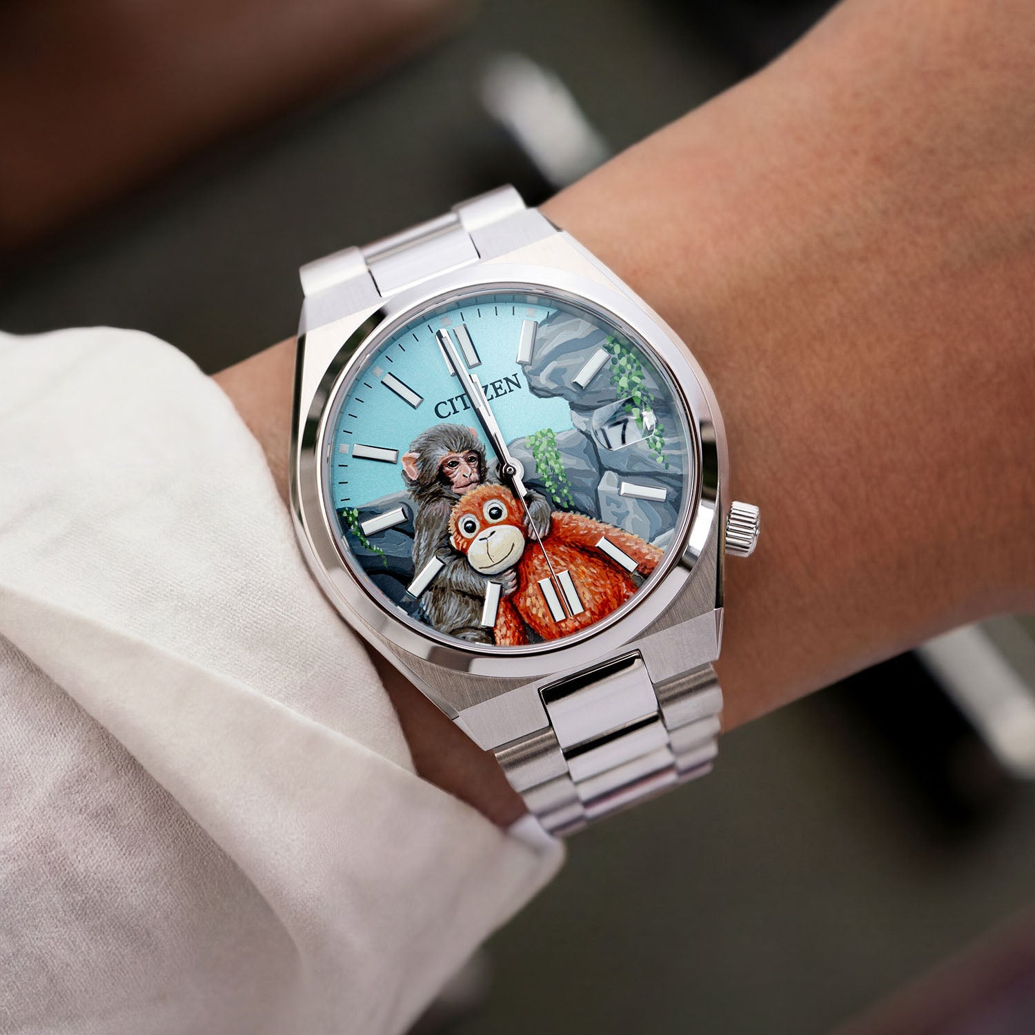 Citizen Tsuyosa Punch — Hand-painted custom Citizen Tsuyosa Automatic featuring a baby snow monkey holding his orange stuffed orangutan plushie inspired by the true story of Punch from Ichikawa City Zoo, a bespoke timepiece by IFL Watches