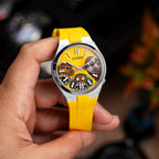 Citizen Tsuyosa Strap – Yellow FKM strap on the hand-painted Wise Guys Concept by IFL Watches, held in the hand