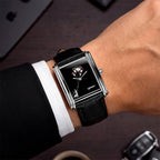 Laphont Bloc Bouquella — Angled on the wrist at a desk, light running along the stepped, polished sides of the steel tank around the hand-painted dial, a limited edition custom timepiece by IFL Watches