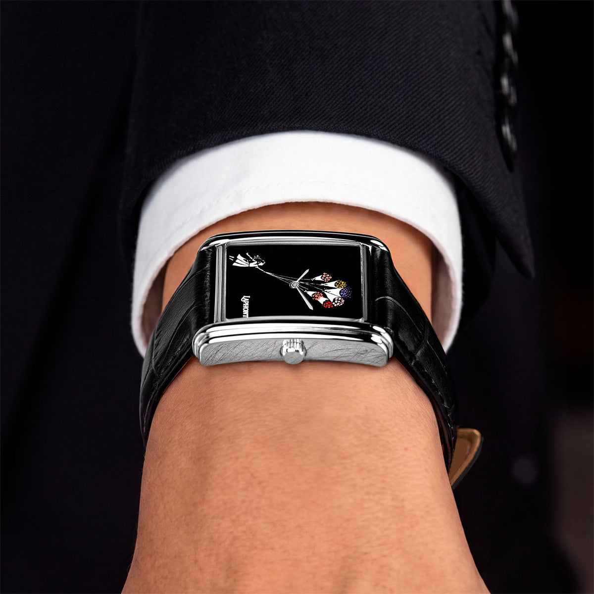 Laphont Bloc Bouquella — Side view on the wrist from the crown, showing the slim profile of the stepped steel case beneath a white cuff, a hand-painted limited edition watch by IFL Watches