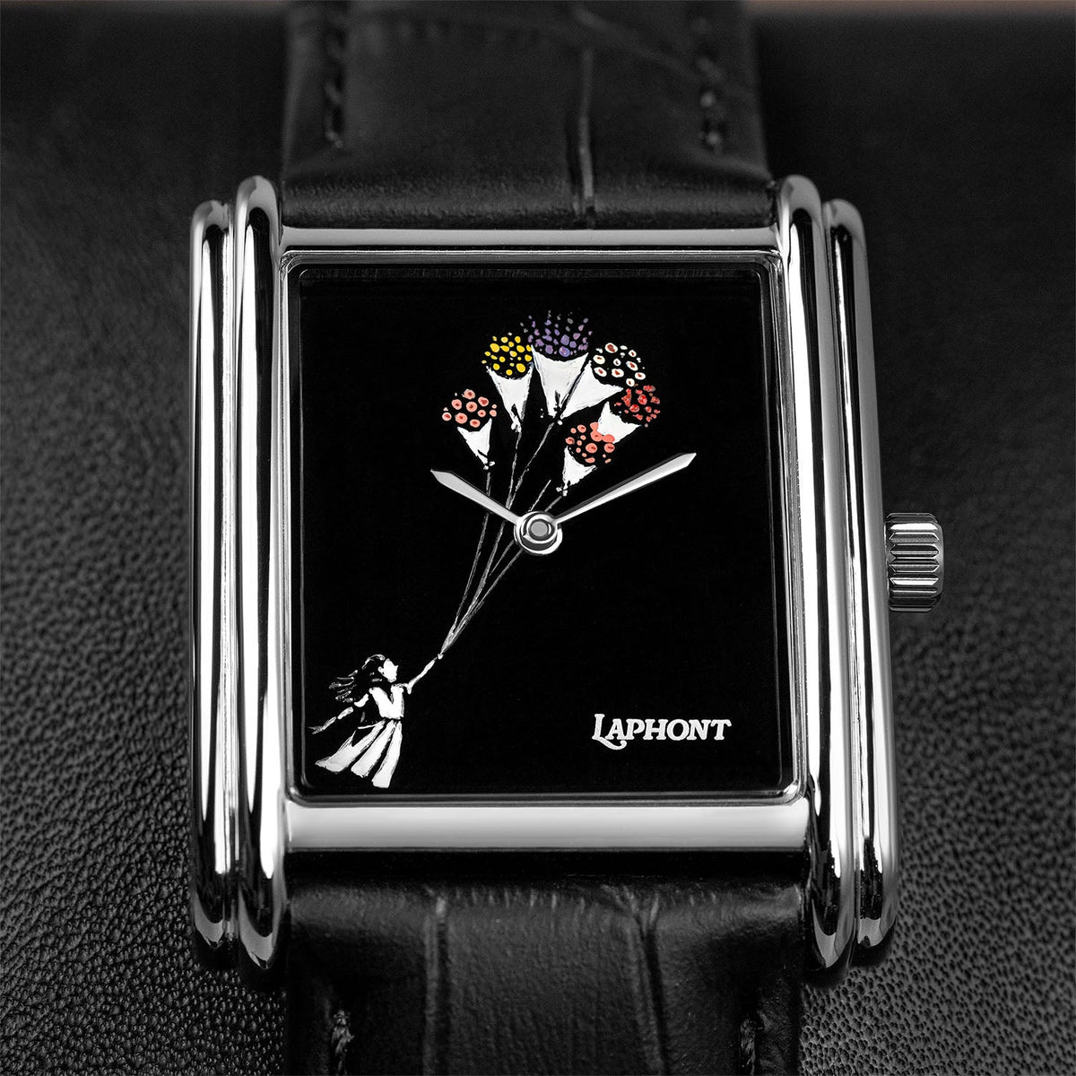 Laphont Bloc Bouquella — Close-up of the hand-painted girl holding the strings of her bouquets, the hands turning at the centre of the glossy black dial inside the stepped steel case, a custom limited edition watch by IFL Watches