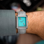 Laphont Bloc Cloudling — Seen from above on the wrist, the grey sleeve pushed back from the stepped steel case and the teddy bear rising on its balloons, a custom limited edition watch by IFL Watches