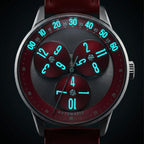Mandetbrote Wandering Hour Burgundy — In the dark, with the hour numerals and minute track glowing, available at IFL Watches.