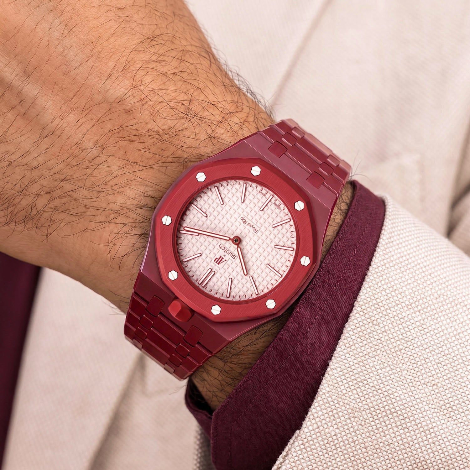 Otto Rosso Swatch × AP Royal Pop Bioceramic Case-Strap — worn in a lounge scene, by IFL Watches
