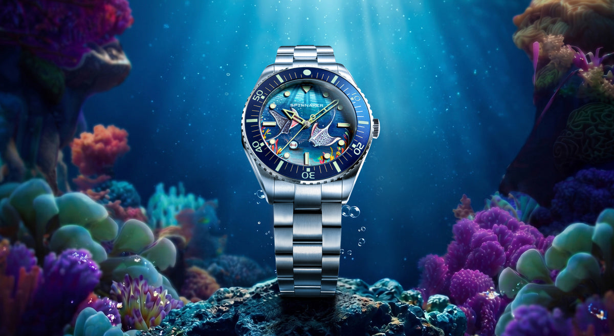 Spinnaker Spence Underwater Dancers Limited Edition — Desktop banner with the watch resting among sea anemone tentacles in sunlit water
