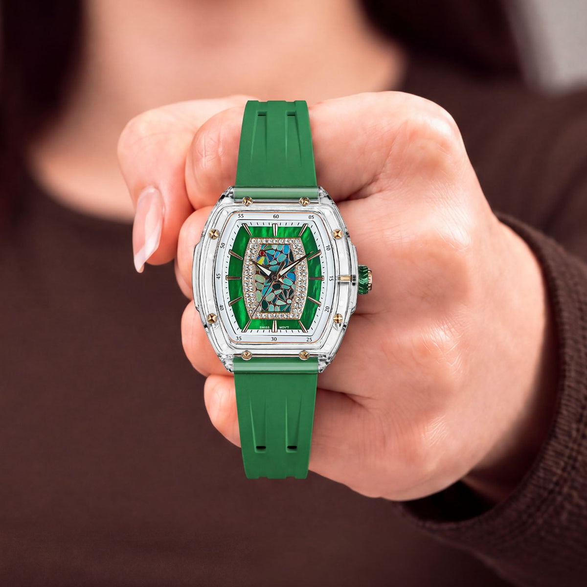 Tsar Bomba Nucleus Femme 02 Green — Held in hand, showing the transparent case and rose-gold screws, available at IFL Watches.