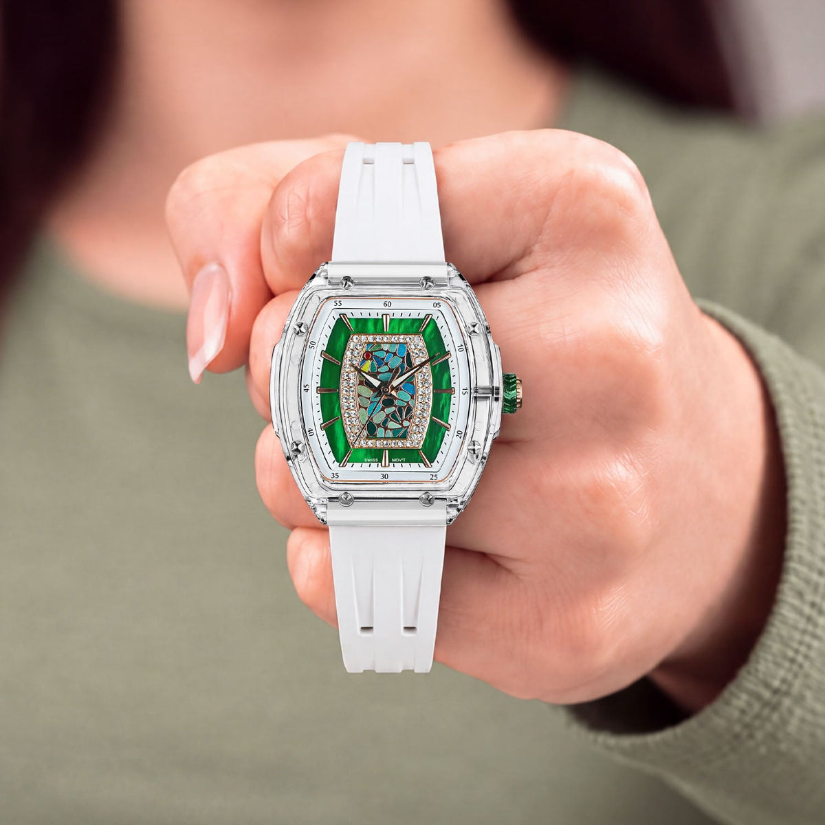 Tsar Bomba Nucleus Femme 02 White Green — Held in hand, showing the transparent case and rose-gold screws, available at IFL Watches.