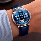 Vortichron Double Roller Blue — Worn on wrist at an angle, showing the rollers and visible balance wheel, available at IFL Watches.