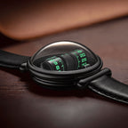 Vortichron Double Roller Midnight Black — Low side view on wood, showing the double-domed sapphire crystal over the rollers, available at IFL Watches.