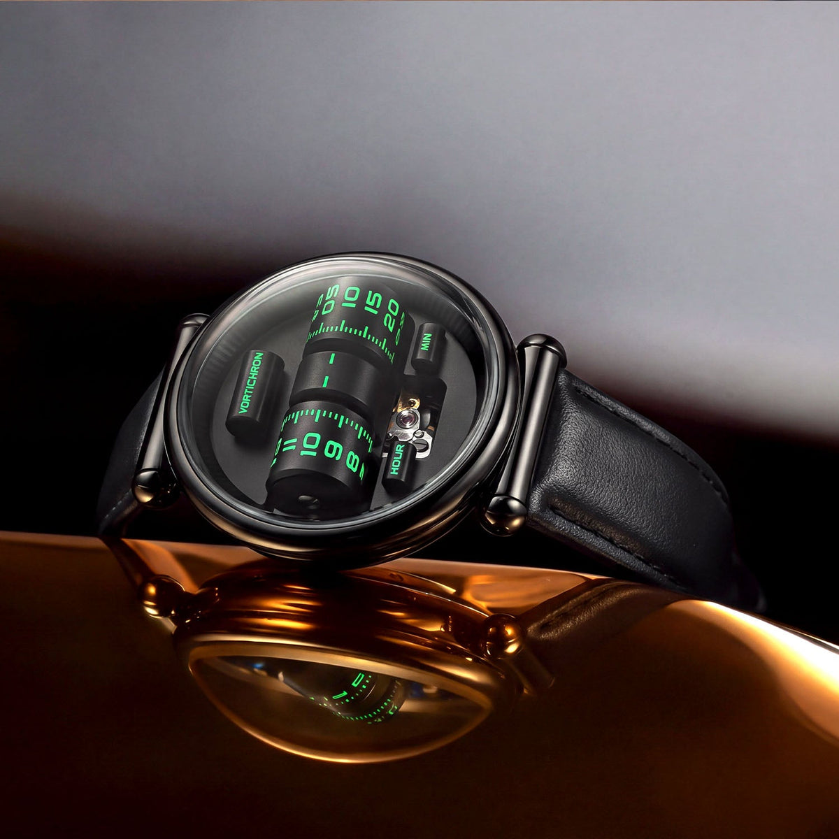 Vortichron Double Roller Midnight Black — Angled on a reflective gold surface, showing the rollers and balance window, available at IFL Watches.