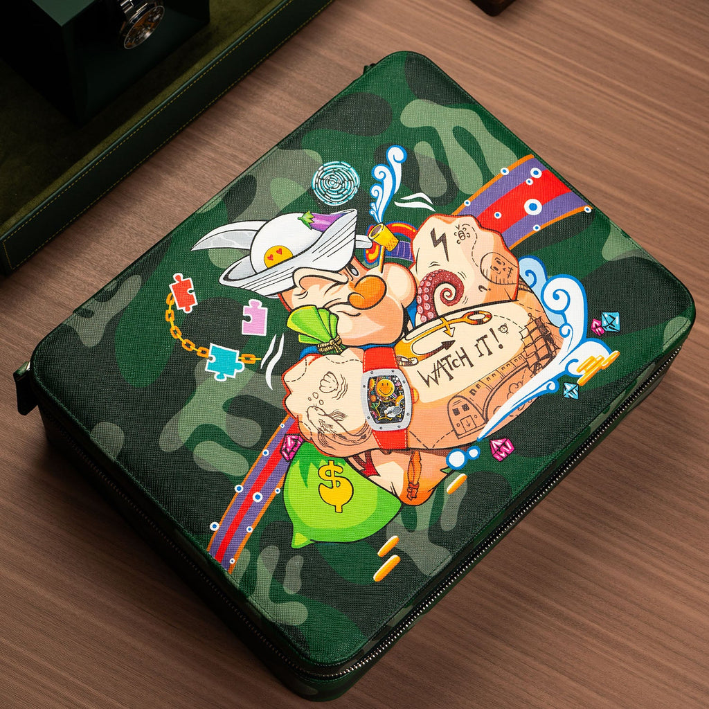 The Coollector Box — angled view of the green camo Saffiano leather watch case showing the hand-painted artwork, bespoke accessory by IFL Watches.